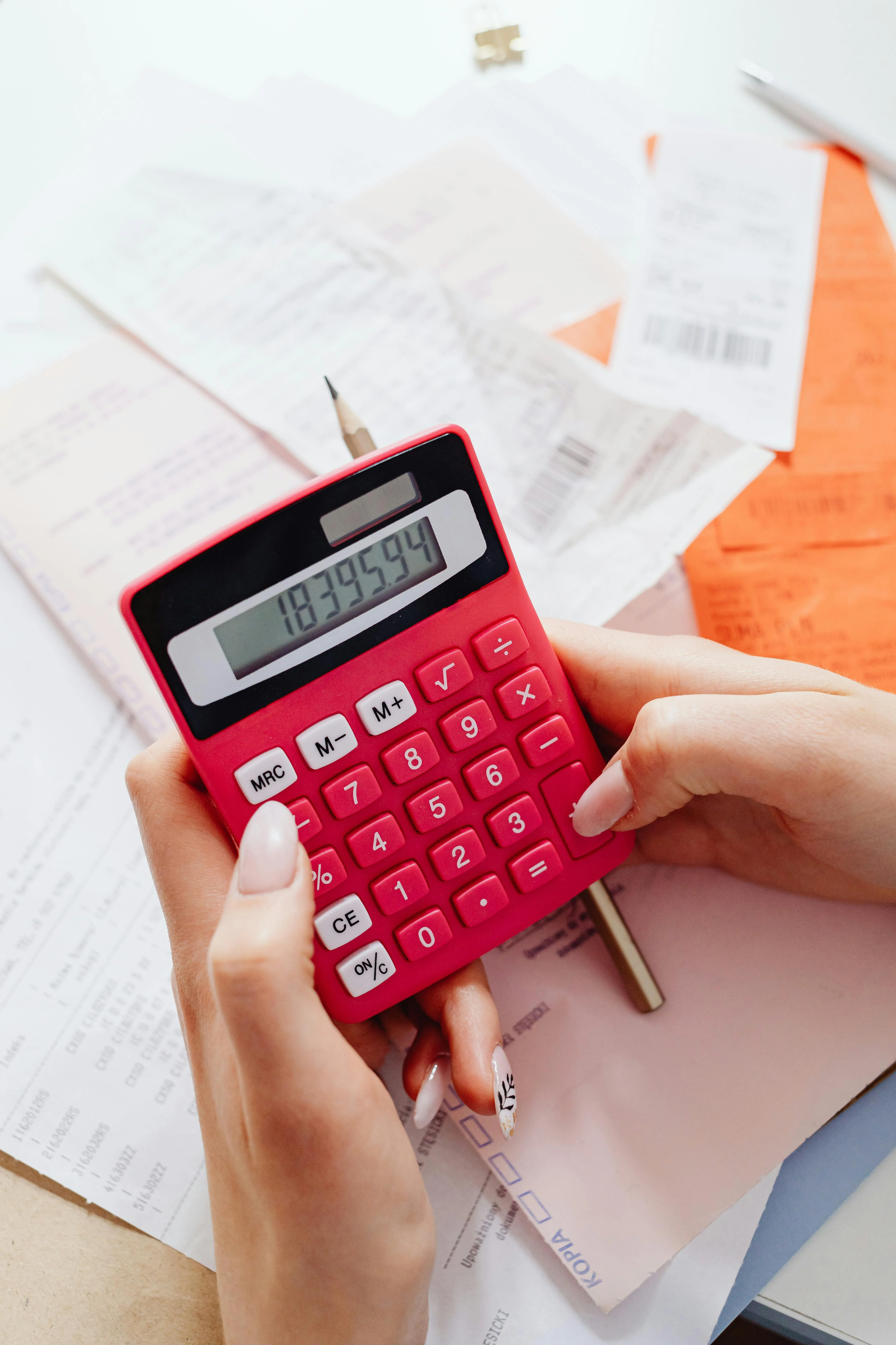 Sorting receipts and calculating figures - Bookkeeping Cleanup Services